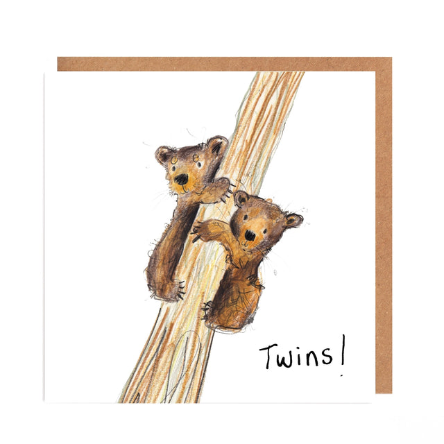 Card with two illustrated baby moles on a branch and the word 'Twins!' below.