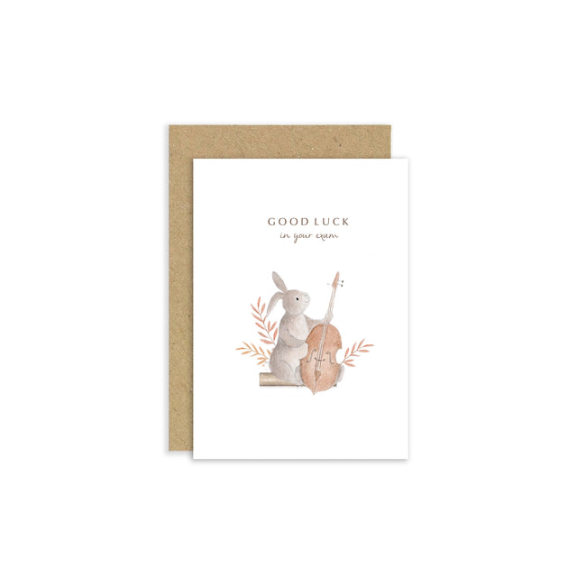 Greeting card with a rabbit playing a violin and 'Good Luck' text, on a white background.