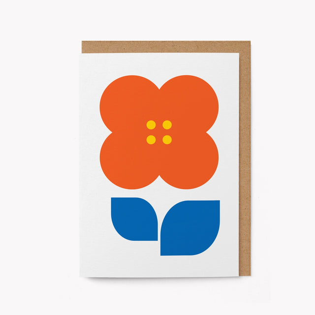Greeting card with a stylized orange flower and blue leaves on a white background