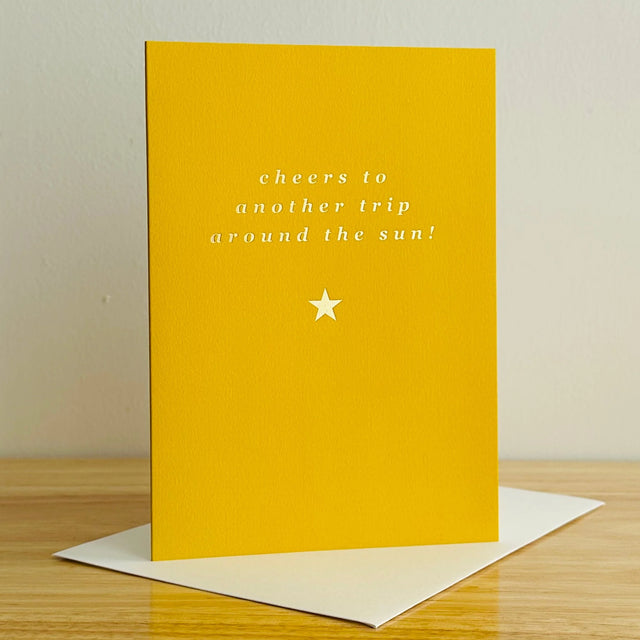 trip-around-the-sun-saville-row-greeting-card-megan-claire