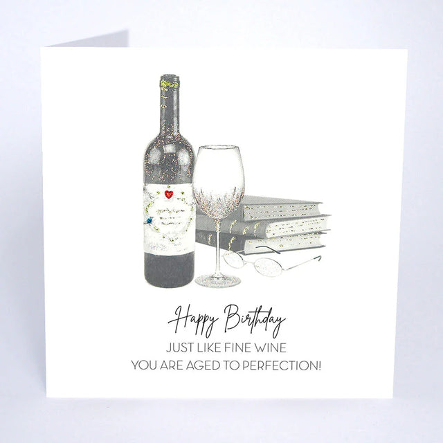 Greeting card with wine bottle and glass design, featuring a birthday message.