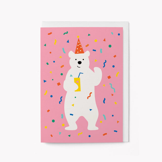 Illustration of a polar bear in a party hat with colorful confetti on a pink background
