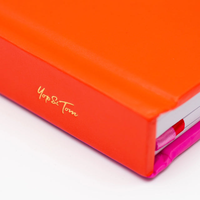 red-pink-lined-notebook-yop-tom