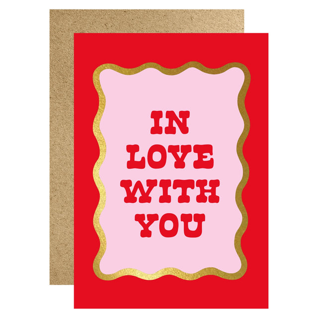 Greeting card with 'In Love With You' text on a red background