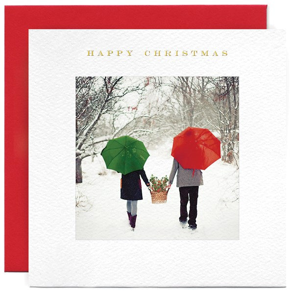 festive-couple-with-umbrellas