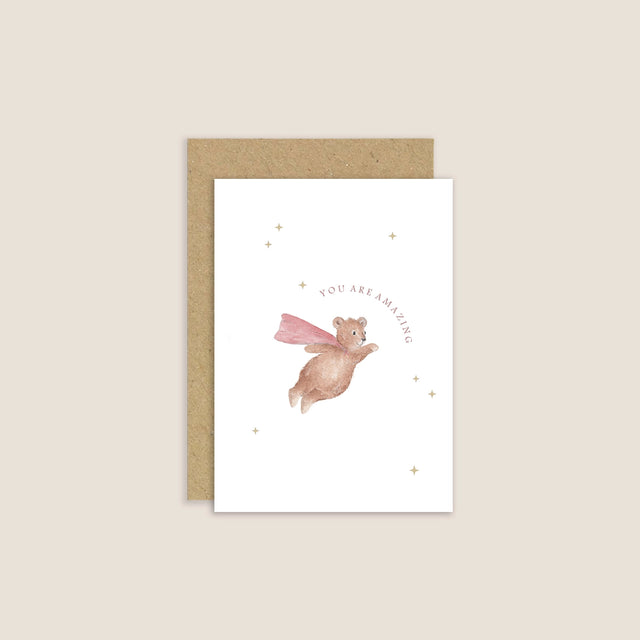 Greeting card with fairy illustration and 'You are amazing' text on a beige background