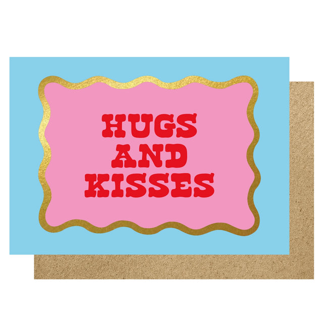 Card with 'Hugs and Kisses' text on a pink background with gold border against a blue and brown border.